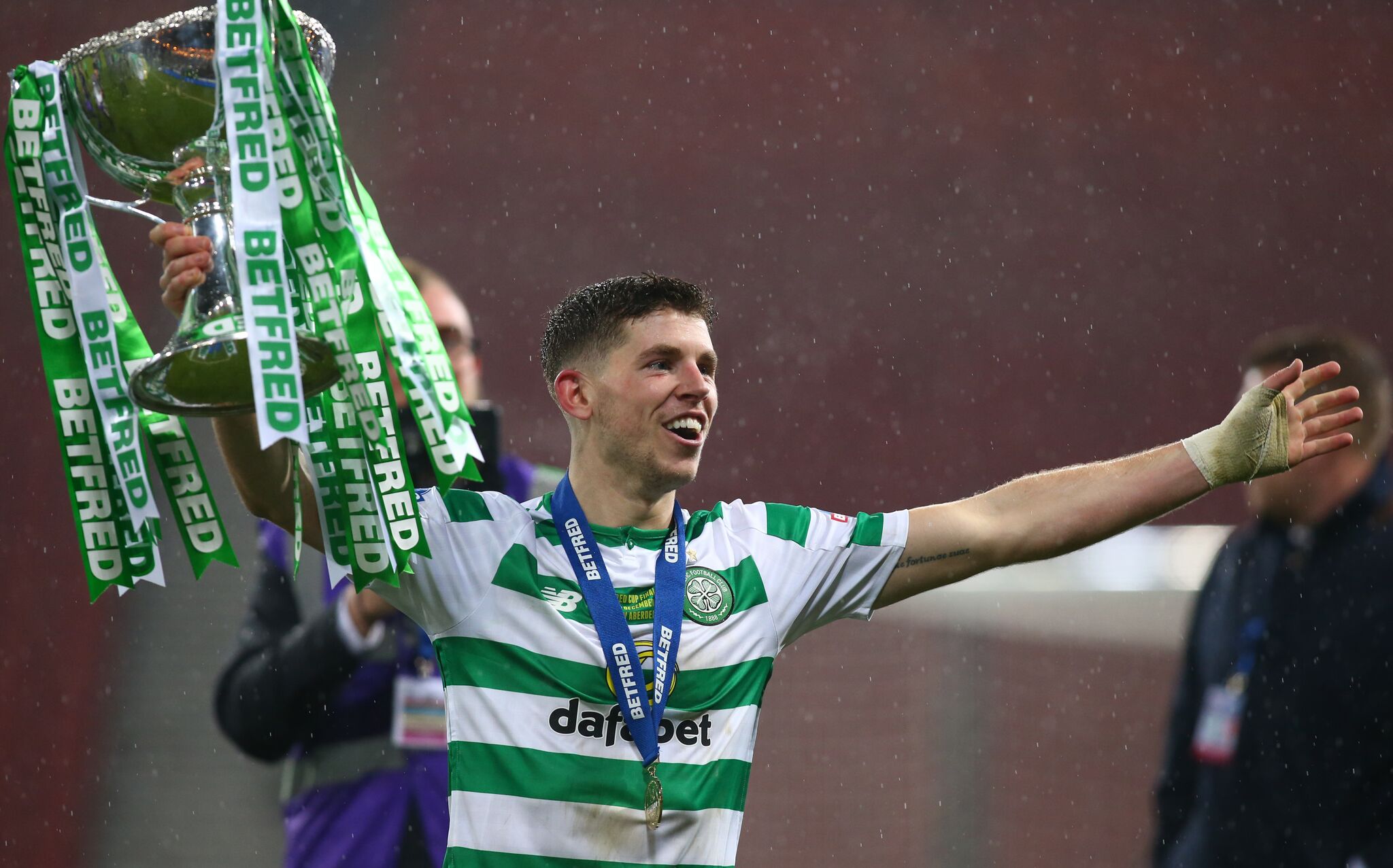 Ryan Christie with the cup