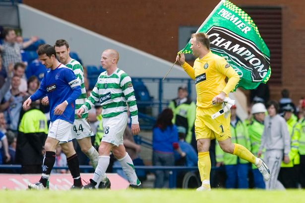Artur Boruc celebrates at Ibrox 