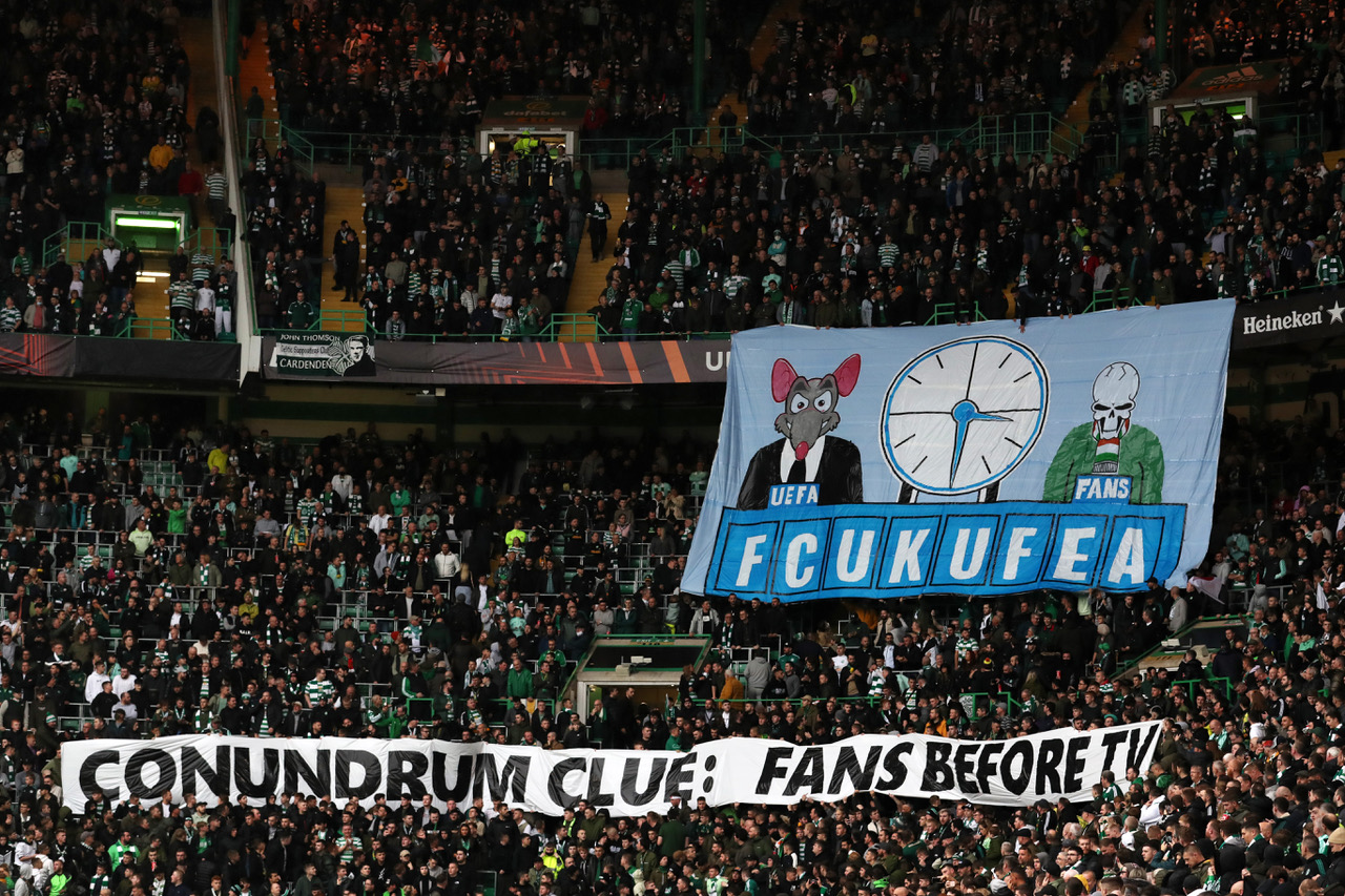 Fans of Celtic display a banner