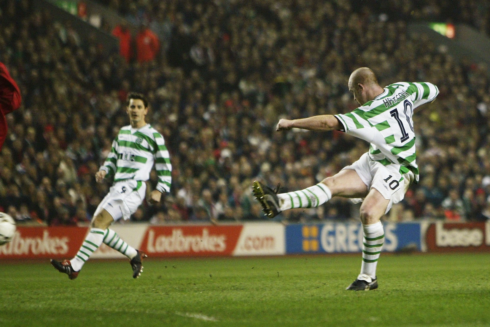 John Hartson of Celtic scores at Anfield 