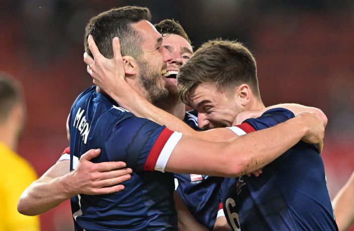 John McGinn, Andy Robertson and Kieran Tierney