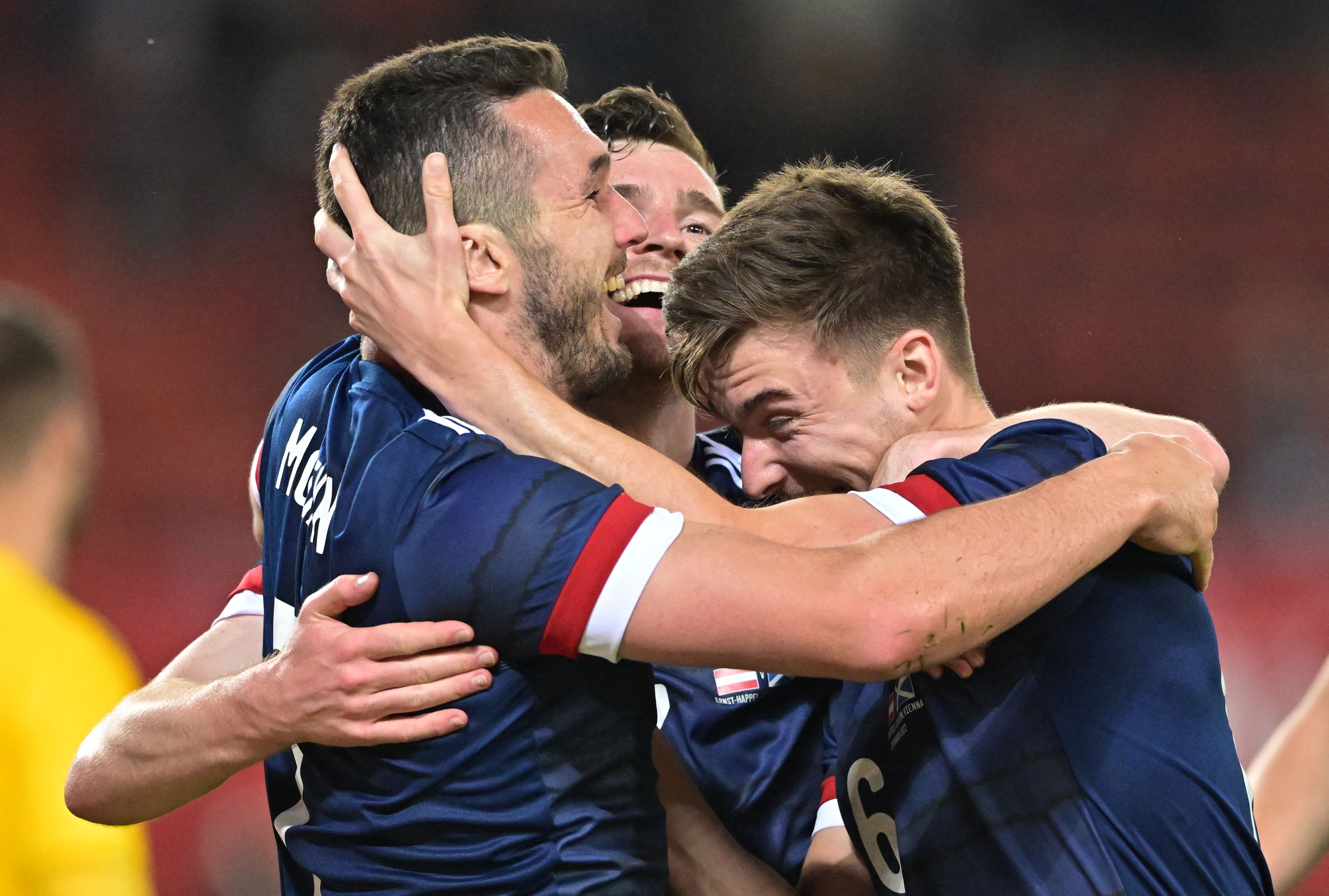 John McGinn, Andy Robertson and Kieran Tierney 