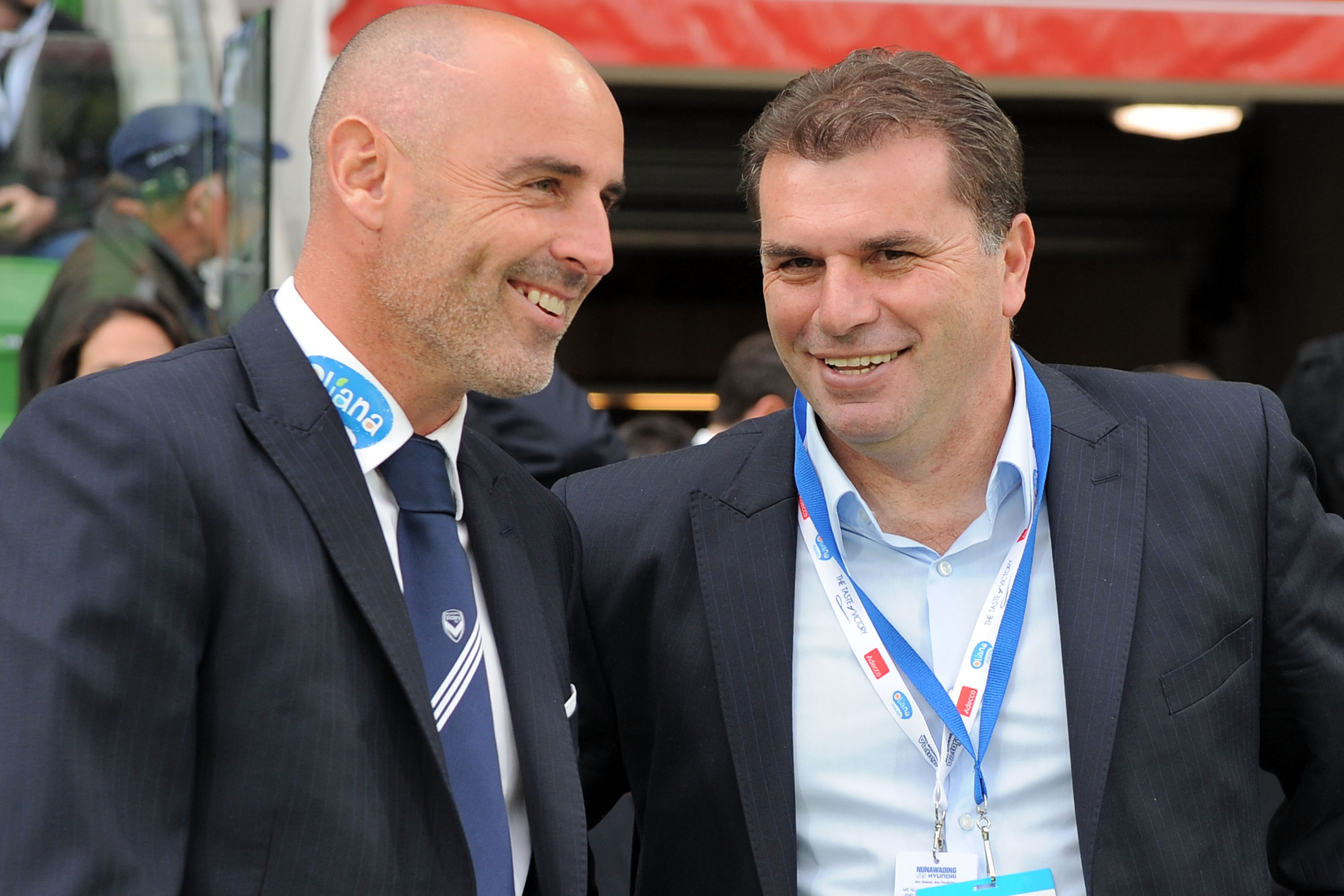 Kevin Muscat talks to socceroos coach Ange Postecoglou