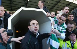 Celtic manager Martin O'Neill is mobbed by supporters