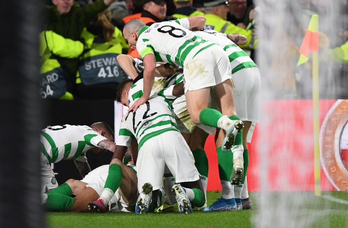 Christopher Jullien is mobbed by teammates