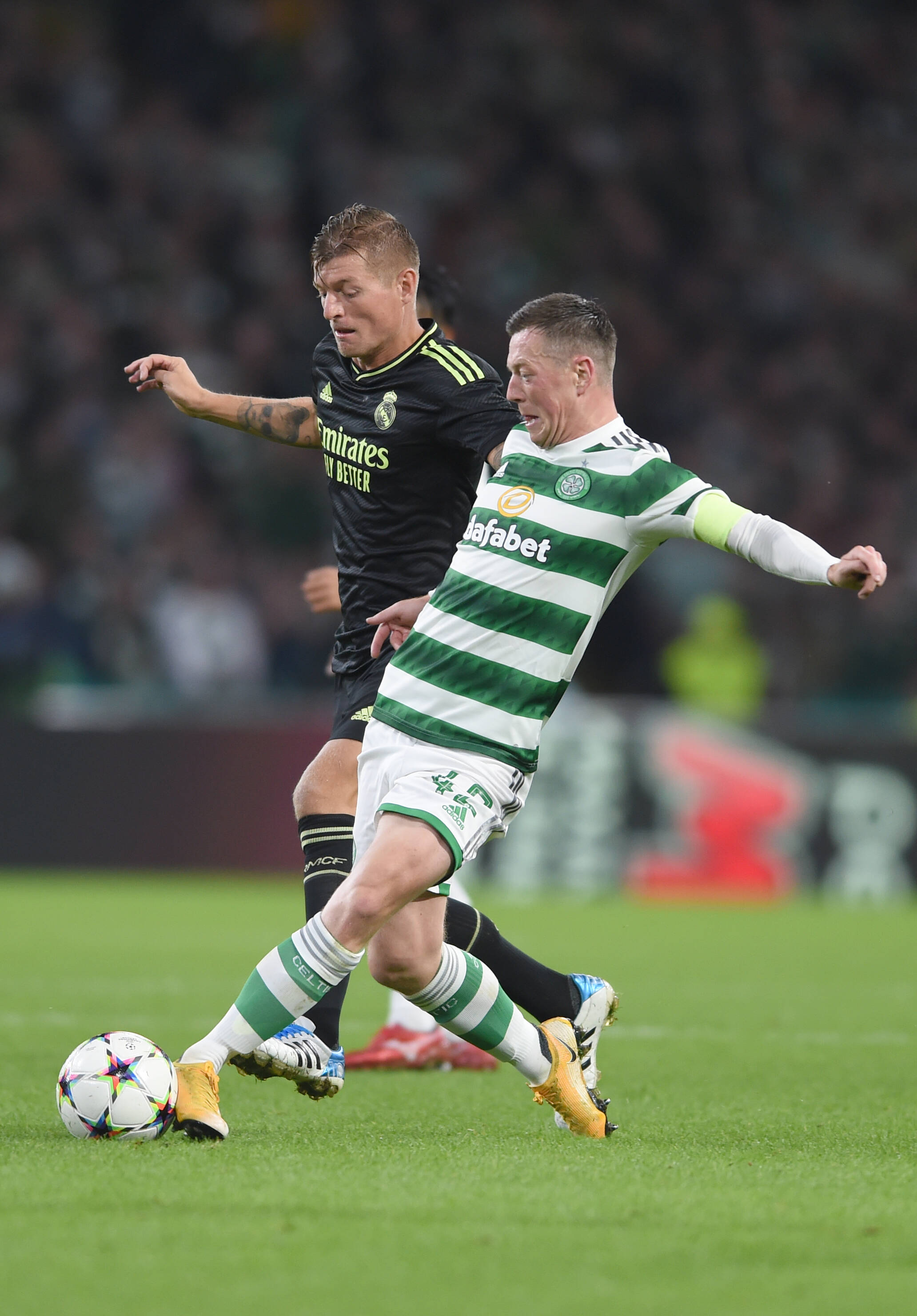 Toni Kroos and Callum McGregor
