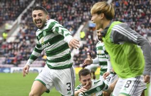 Greg Taylor celebrates