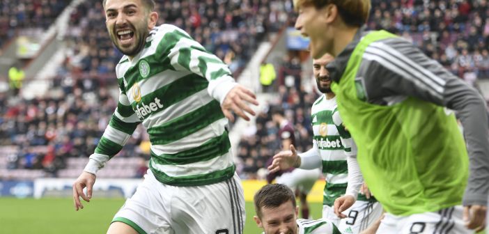 Greg Taylor celebrates