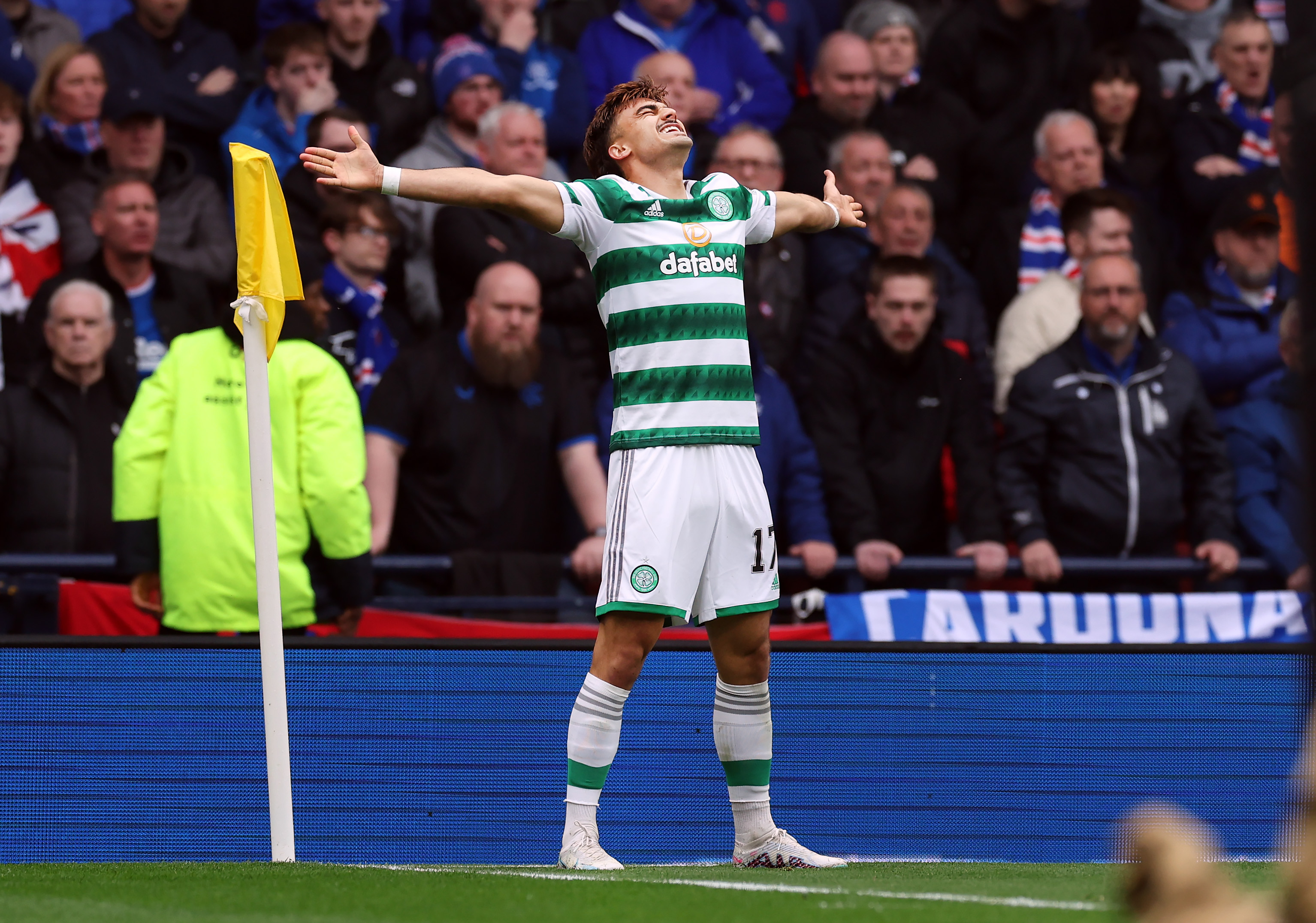 Jota of Celtic celebrating
