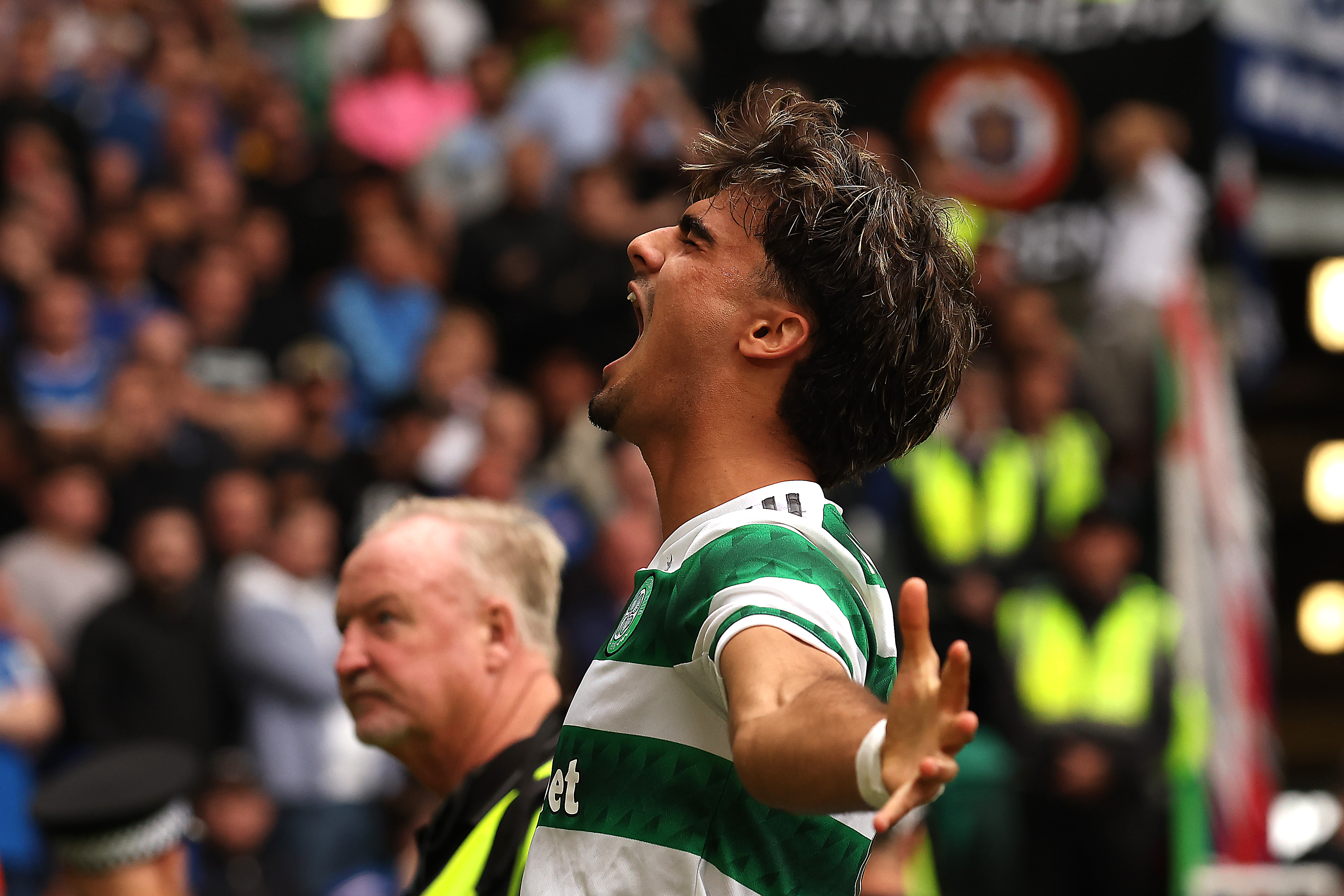 Jota of Celtic celebrates