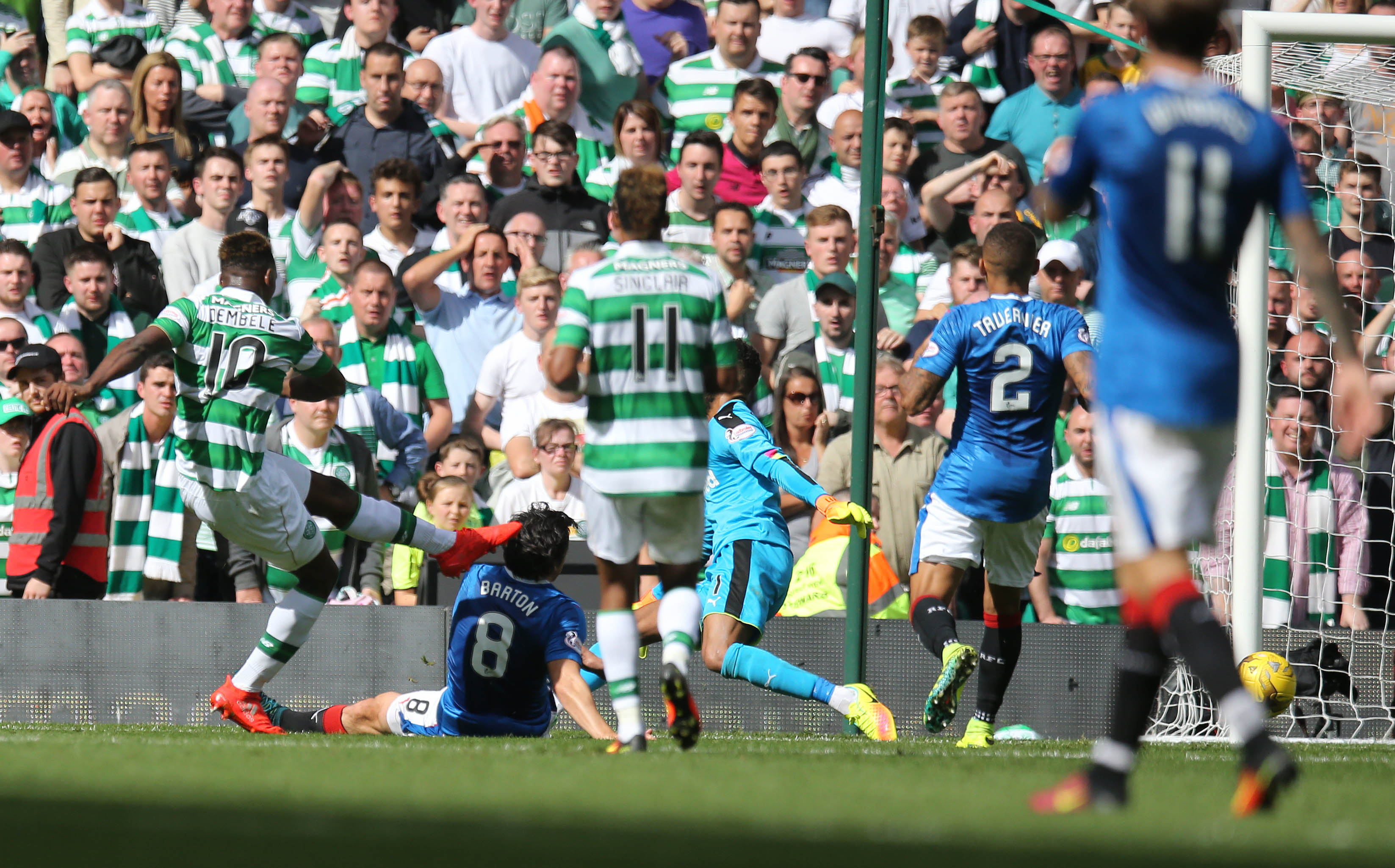 Moussa Dembele celebrates his hat trick