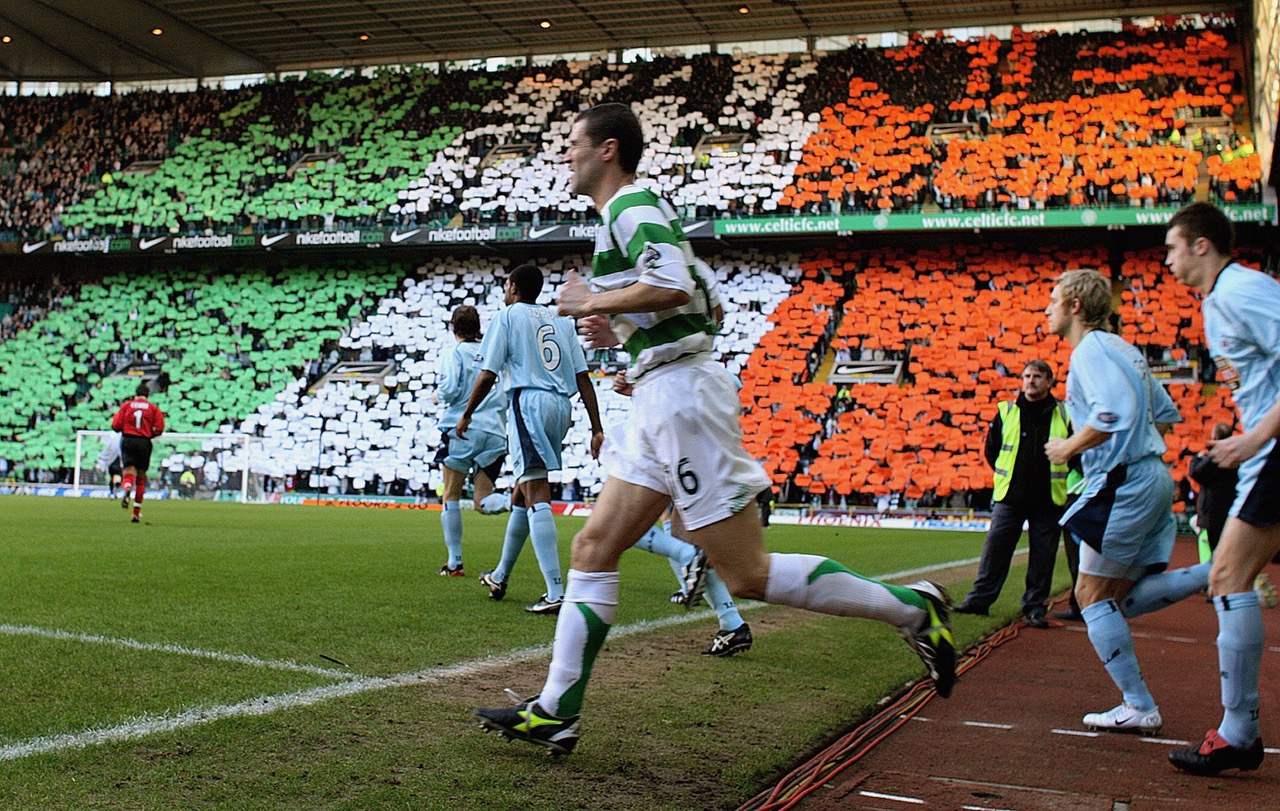 Roy Keane runs out to make his Celtic Park debut