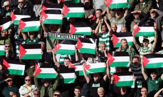 Celtic supporters show their support with Palestine flags