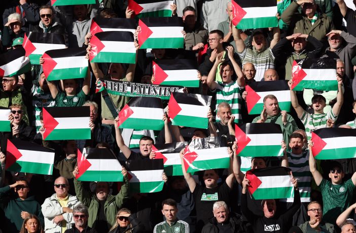 Celtic supporters show their support with Palestine flags