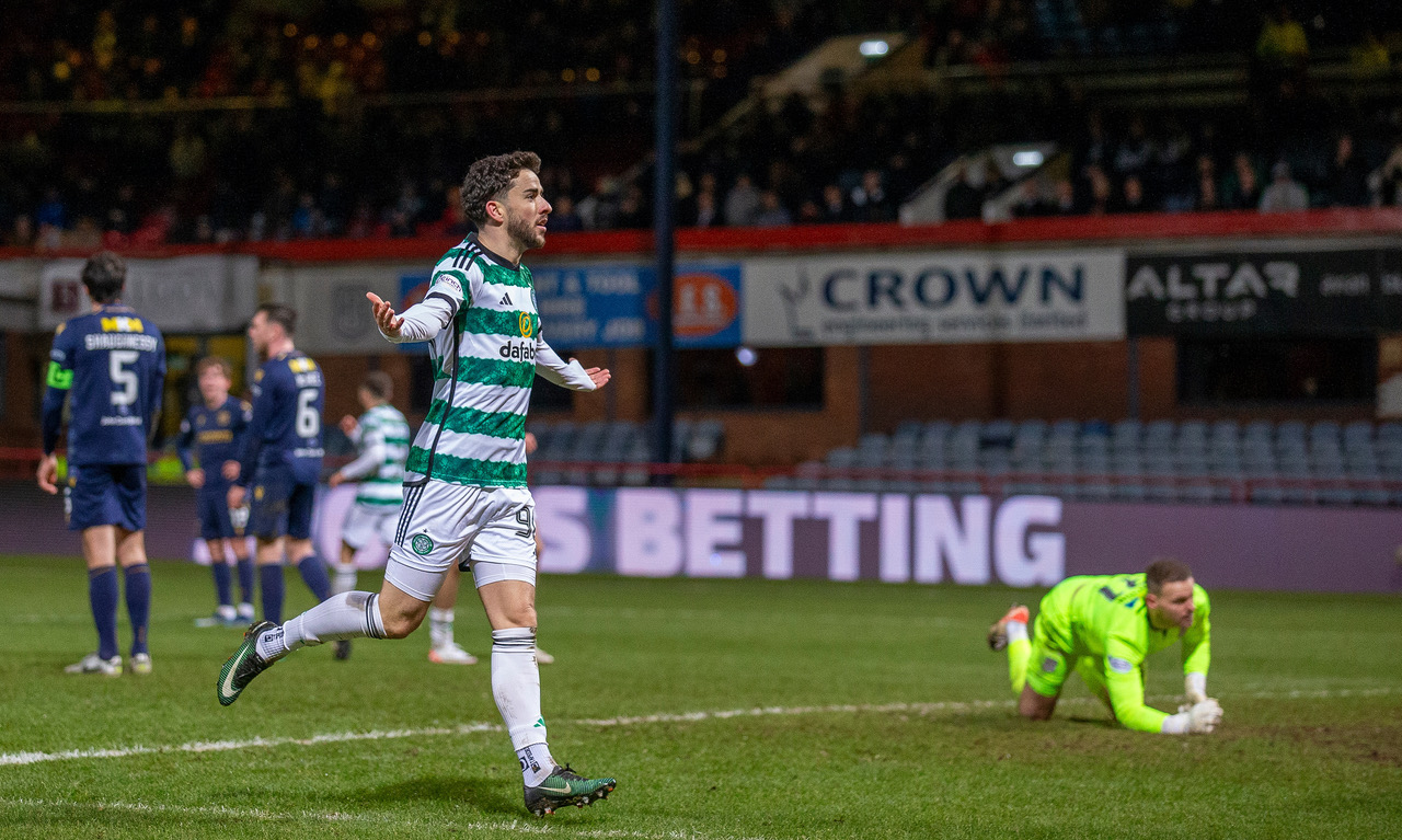 Mikey Johnston celebrates