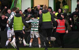 Paulo Bernardo celebrates with the Green Brigade