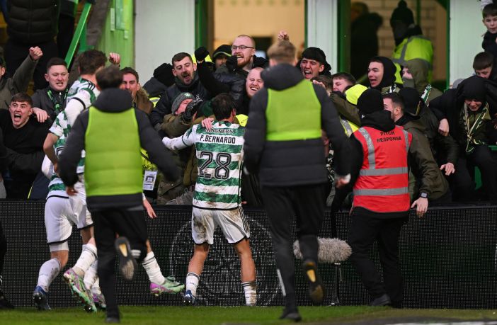 Paulo Bernardo celebrates with the Green Brigade