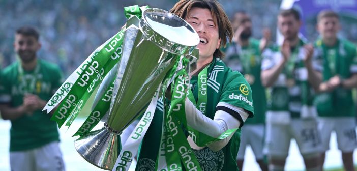 Kyogo with the trophy