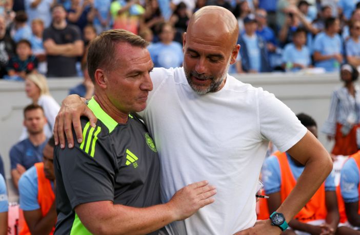 Celtic manager Brendan Rodgers meets with Manchester City manager Pep Guardiola