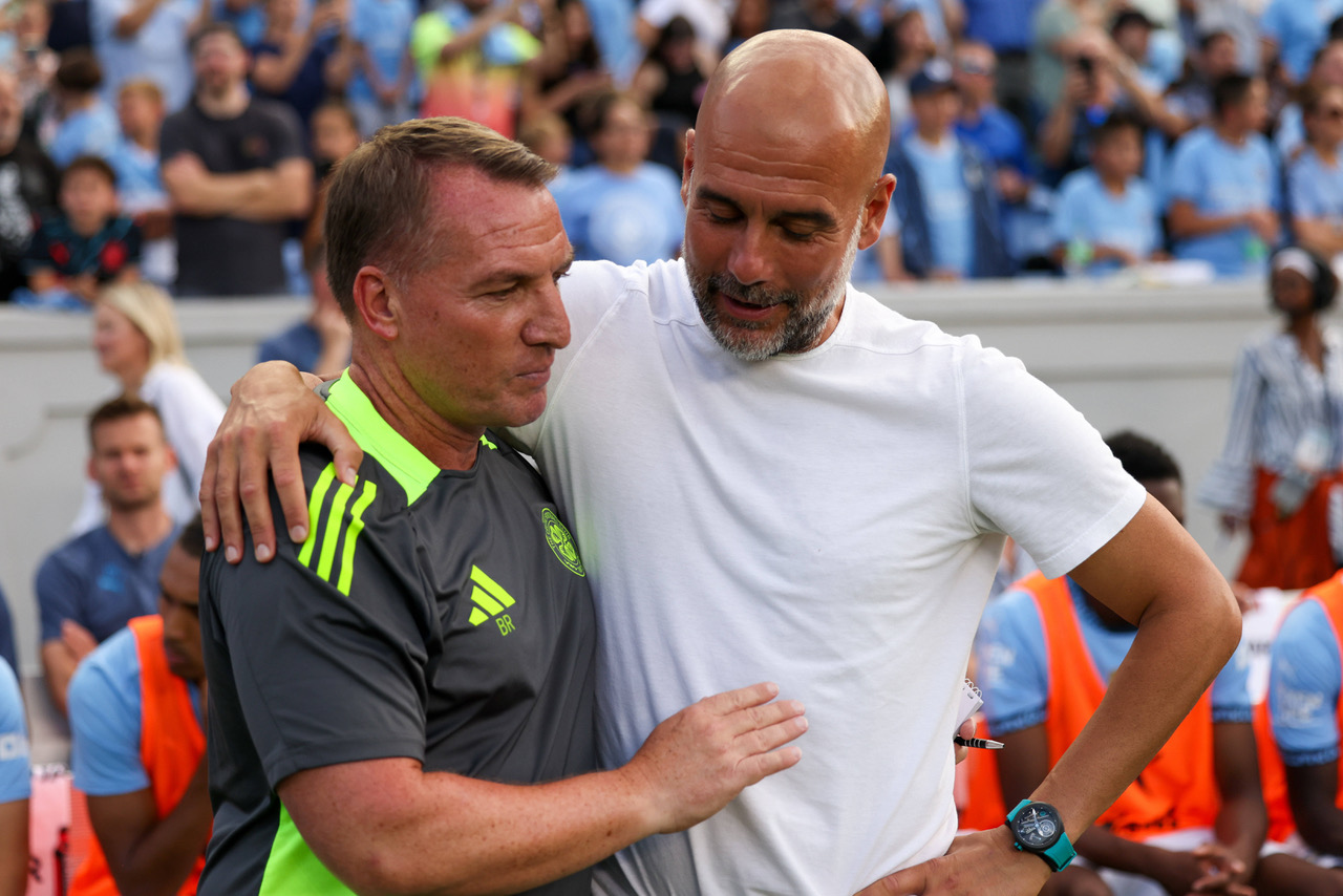 Celtic manager Brendan Rodgers meets with Manchester City manager Pep Guardiola