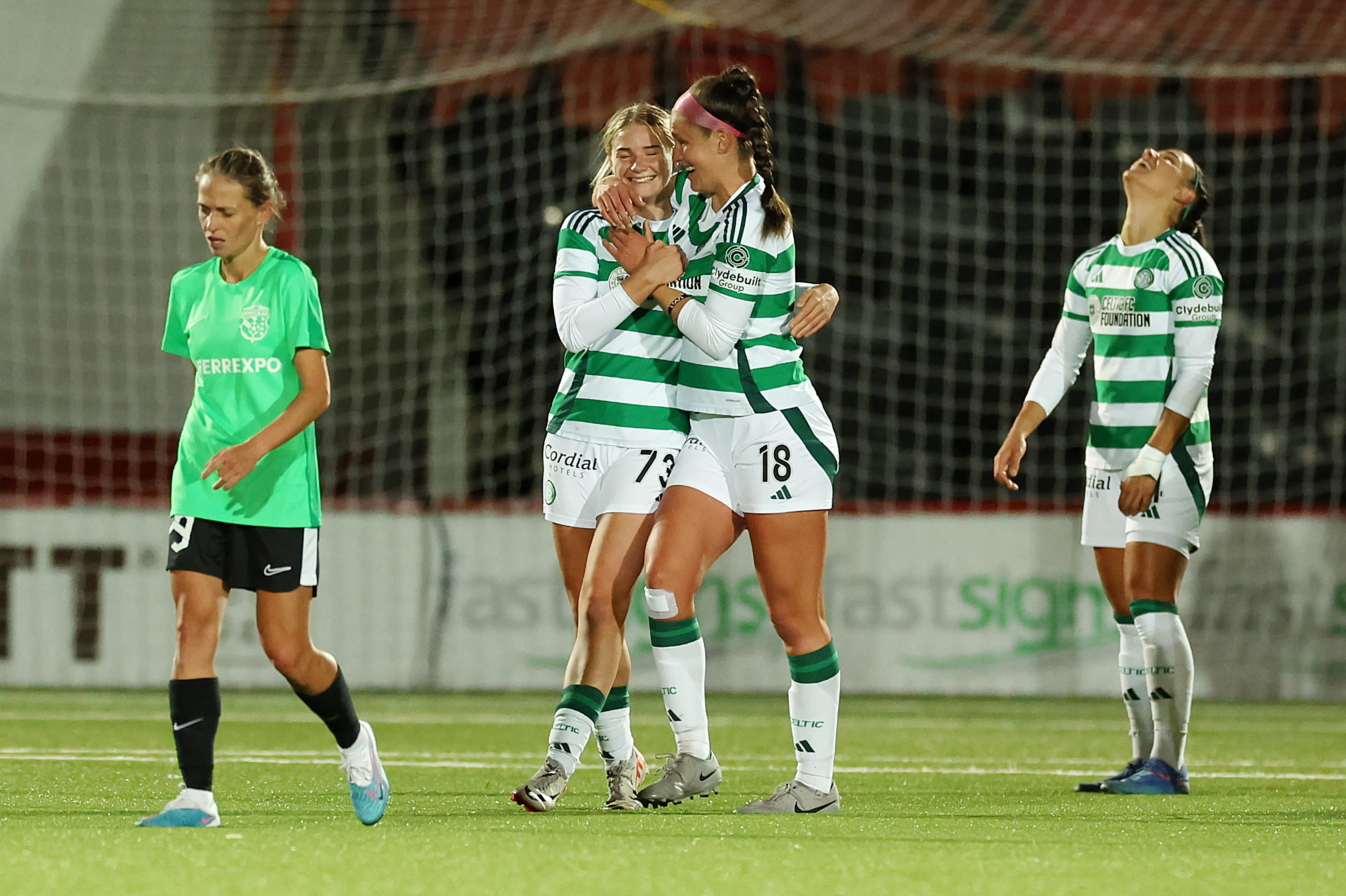 Maria McAneny and Caitlin Hayes celebrate