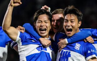 Tomoki Iwata celebrates