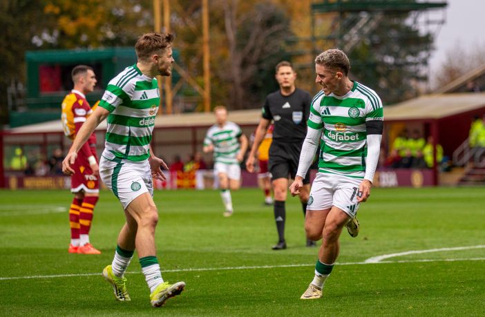 Luke McCowan celebrates with James Forrest
