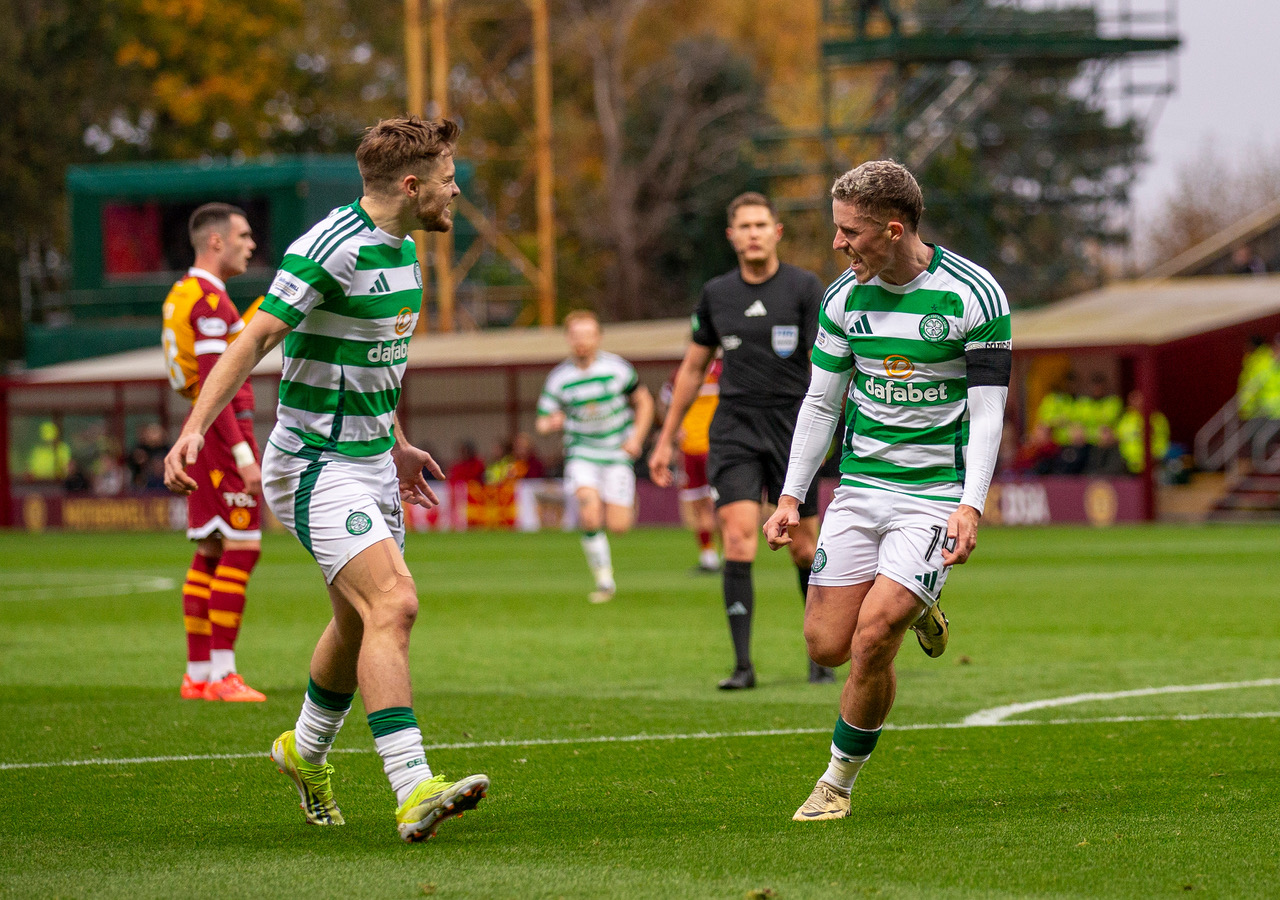 Luke McCowan celebrates with James Forrest