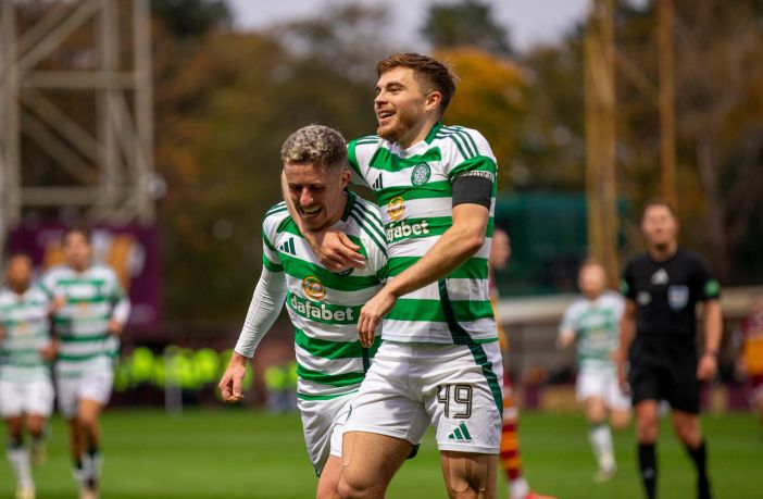 Luke McCowan and James Forrest celebrate