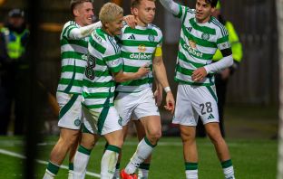 Alistair Johnston is congratulated by his teammates