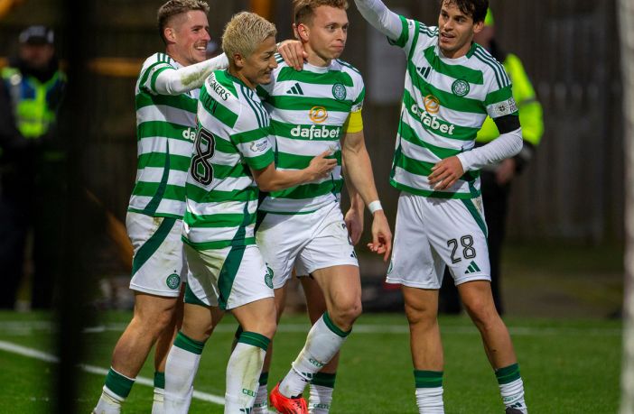 Alistair Johnston is congratulated by his teammates