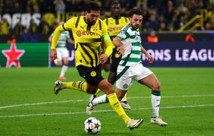 Greg Taylor battles for the ball