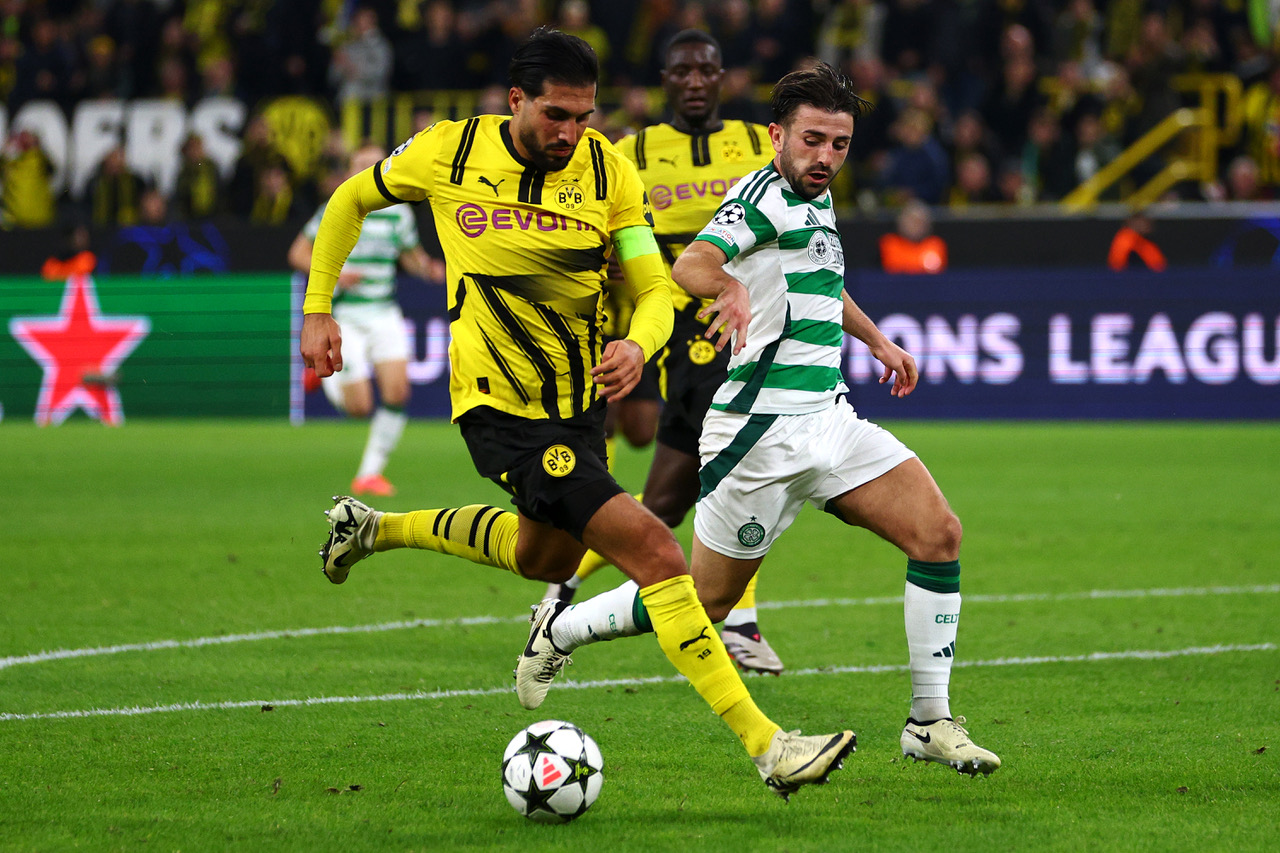 Greg Taylor battles for the ball 