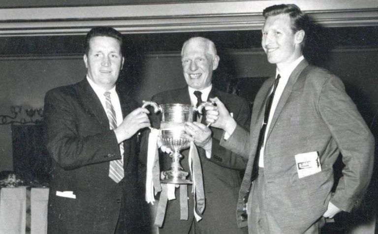 Stein, Kelly and McNeill with the cup