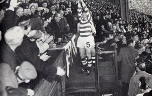 Billy McNeill lifts the League Cup after the win over Rangers