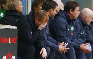 Neil Lennon with his head in his hand