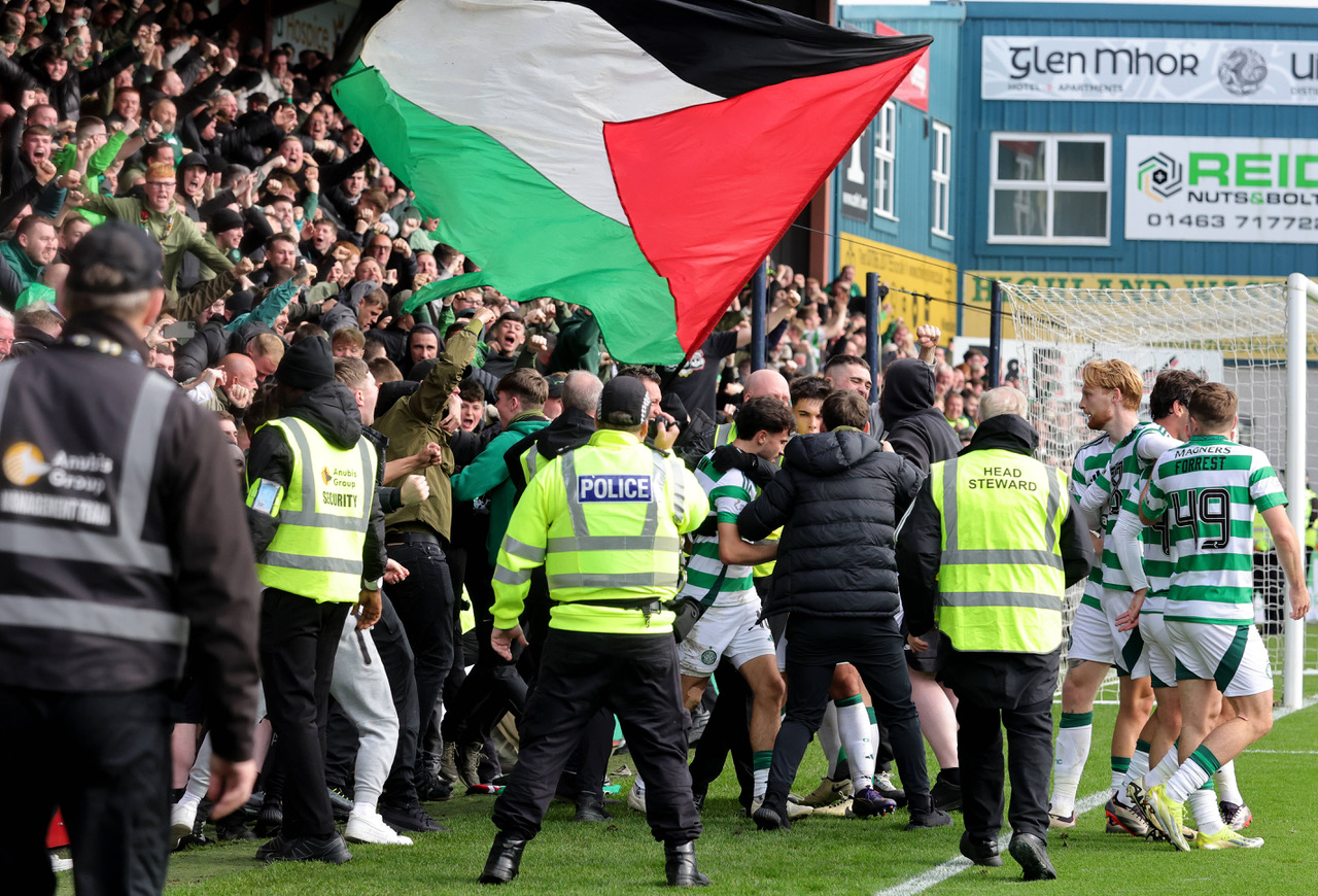 Nicolas Kuhn, already on a yellow, celebrates with the Celtic supporters after scoring the winner