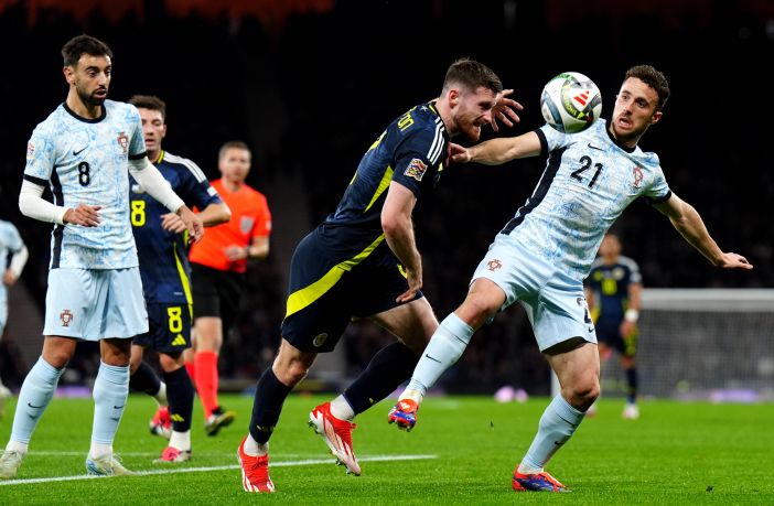 Anthony Ralston in action against Portugal