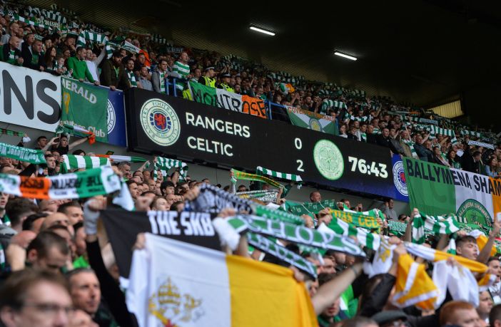 Celtic fans celebrate at Ibrox