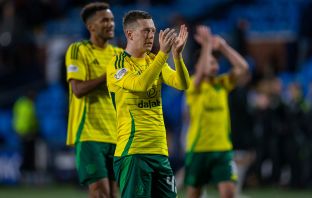 Auston Trusty and Callum McGregor applaud the support