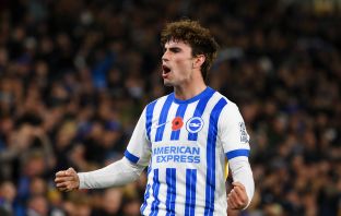 Matt O'Riley celebrates