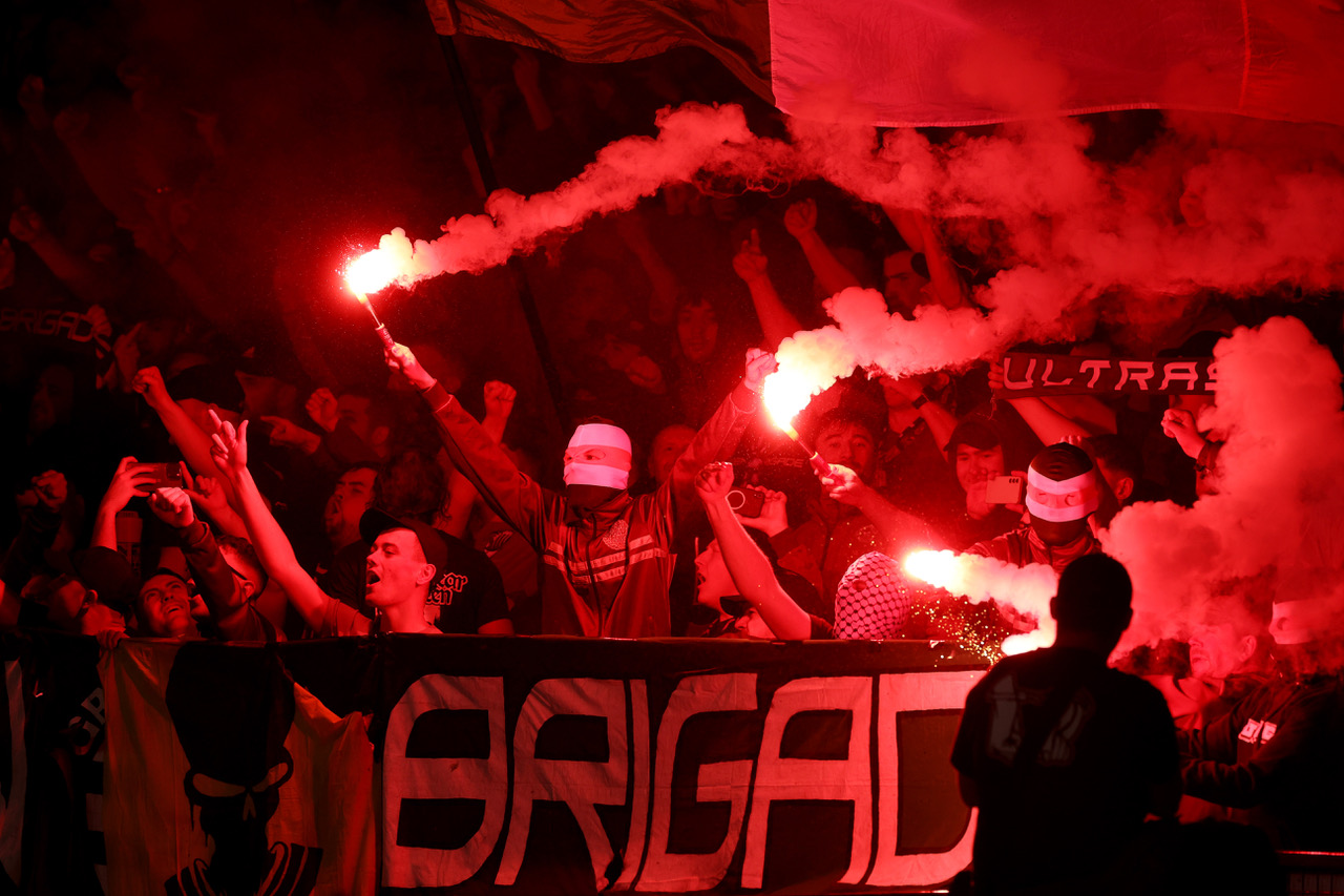 Green Brigade with flares at Hampden