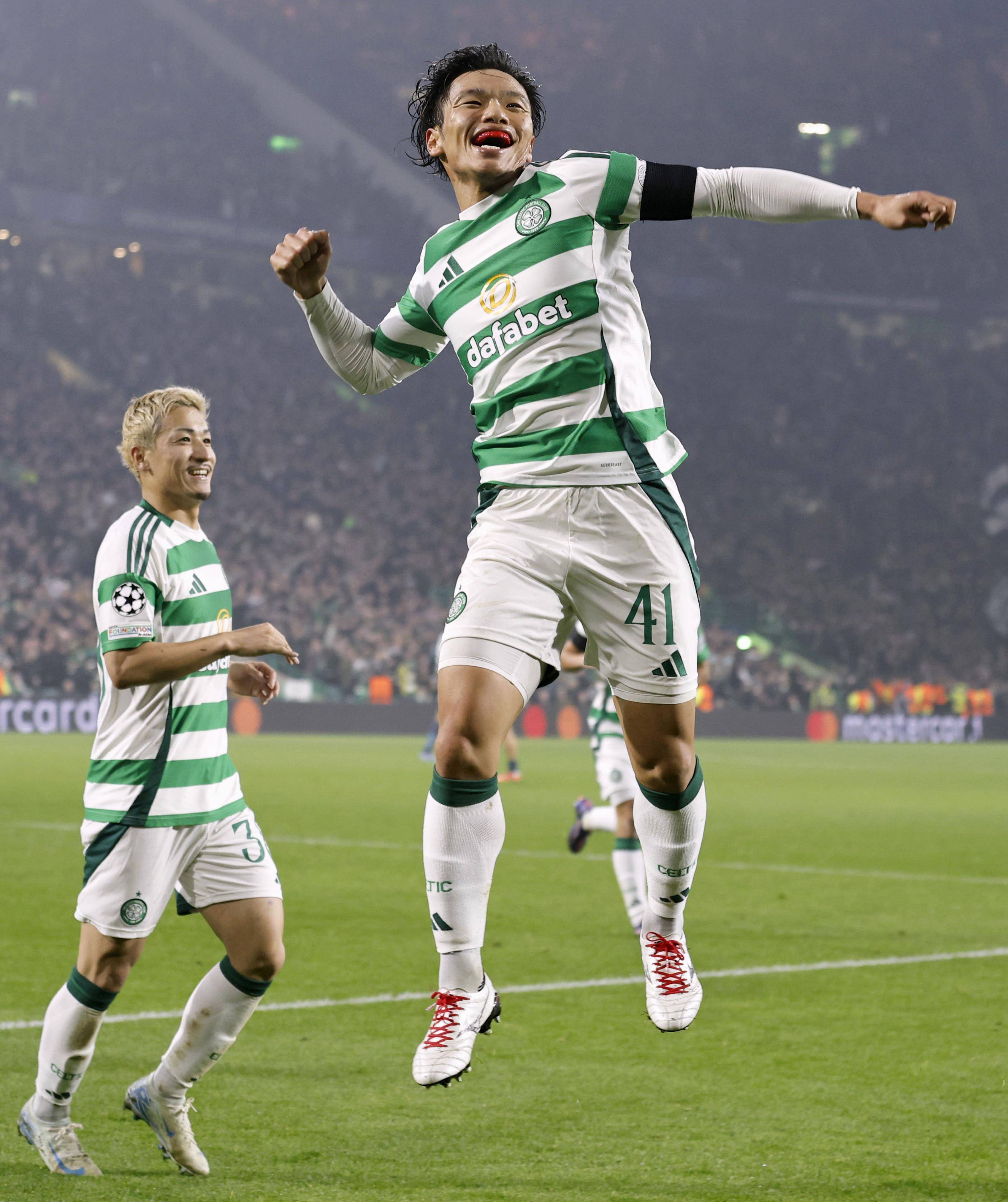 Reo Hatate celebrates