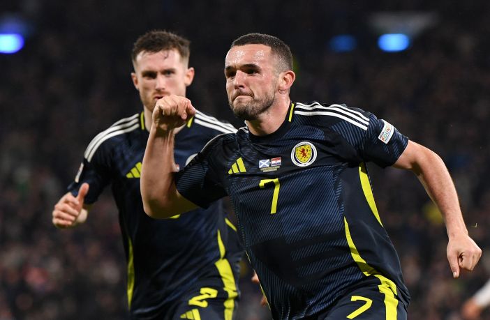 John McGinn and Anthony Ralston celebrate