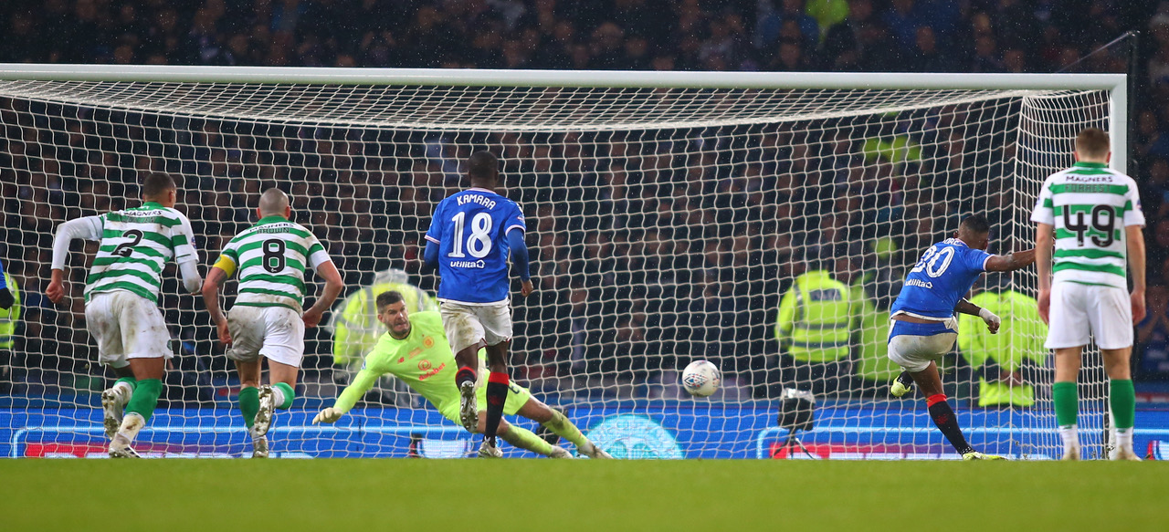 Fraser Forster saves the penalty 