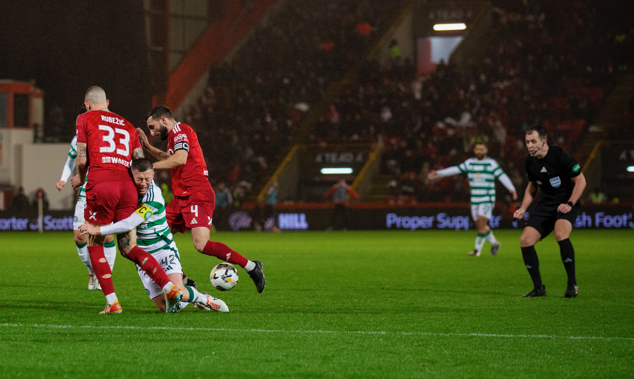 Callum McGregor is fouled