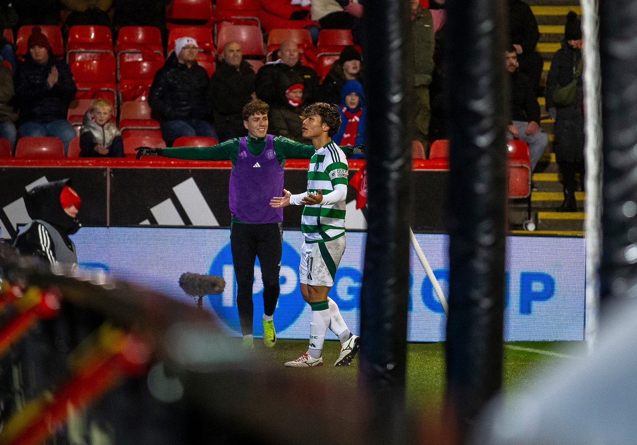 Reo Hatate celebrates