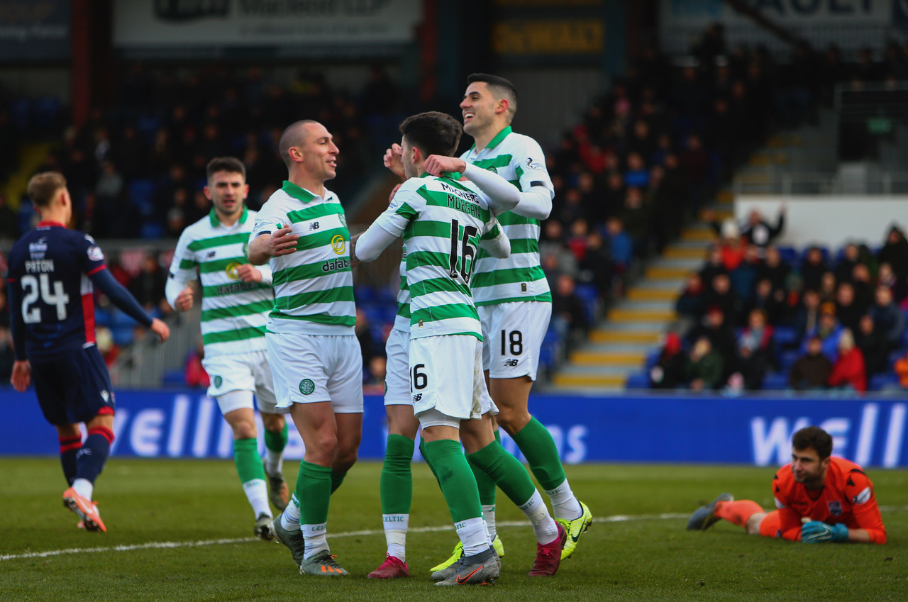 Tom Rogic celebrates