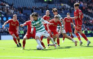 Reo Hatate runs with the ball from Leighton Clarkson