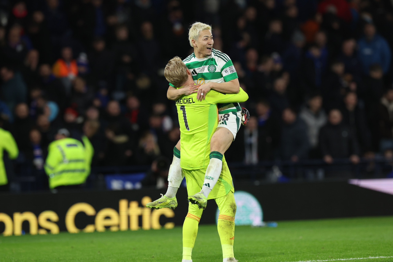 Daizen Maeda and Kasper Schmeichel celebrate